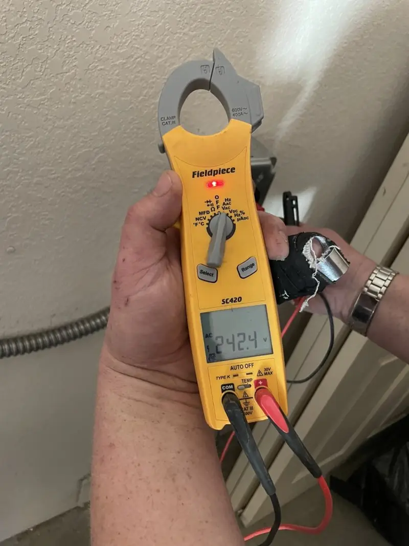 Voltage testing with clamp meter during Ceiling Fan Installation in Saltillo